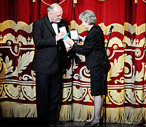 UNESCO Director General Irina Bokova presented the commemorative medal to Vladimir Gridyushko