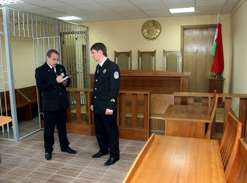 Court officers in a courtroom