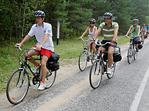 Cyclists on a suburban highway