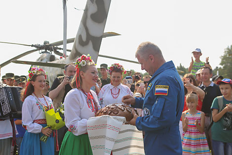 The cosmonaut Oleg Novitsky was met with bread and salt in Borovaya