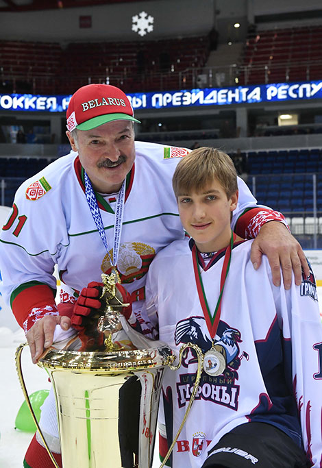 Alexander Lukashenko congratulates Nikolai Lukashenko who won a silver medal at the U15 Golden Puck tournament