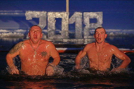 Belarusian Orthodox believers take ice plunges for Epiphany