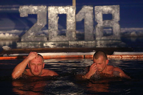 Belarusian Orthodox believers take ice plunges for Epiphany