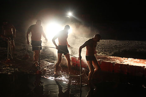 Belarusian Orthodox believers take ice plunges for Epiphany