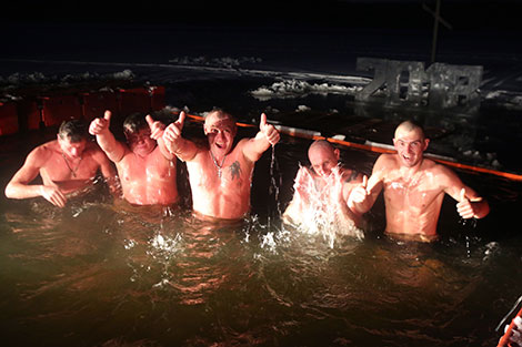 Belarusian Orthodox believers take ice plunges for Epiphany