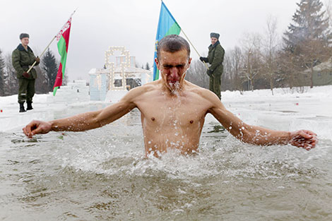 Soldiers of Special Operations Forces take ice plunges for Epiphany