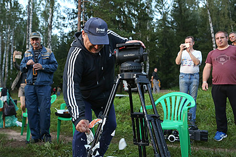 Production director Vladimir Yankovsky smashes a symbolic plate to kick off the biopic filming