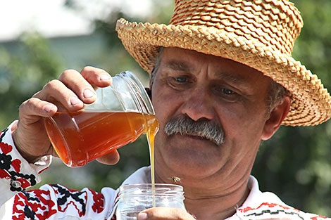 Beekeeper Alexander Plistov at the Savior of the Honey Feast Day in Chechersk.