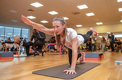 Darya Domracheva holds training session for her Minsk Half Marathon team