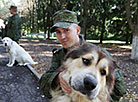 Private Aleksei Kantsov and Caucasian Shepherd Imperia