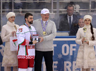 Alexander Lukashenko awards the tournament’s top scorer Pavel Bely (Belarus)