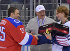 Alexander Lukashenko awards Alexei Yegorov (Russia), the best goalkeeper of the Christmas tournament, and Nikita Volsky (Griffons, Minsk), the best goalkeeper of the Golden Puck tournament