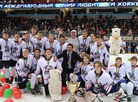 Alexander Lukashenko poses for a photo with Griffons team