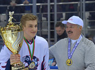 Alexander Lukashenko and Griffons player Nikolai Lukashenko