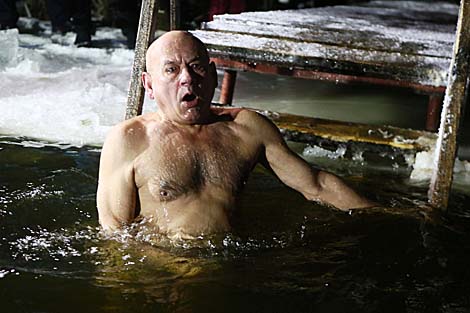 Belarusian dive into ice waters to celebrate Epiphany