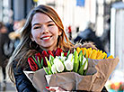 A young woman with flowers 