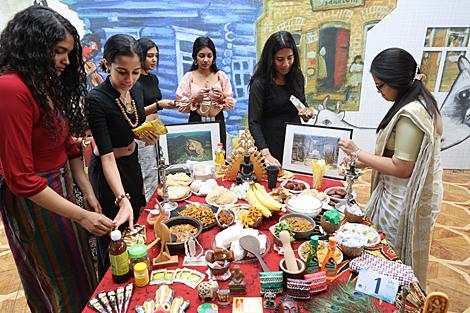 Participants of the Grace International beauty contest demonstrate cooking skills 