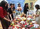 Participants of the Grace International beauty contest demonstrate cooking skills 