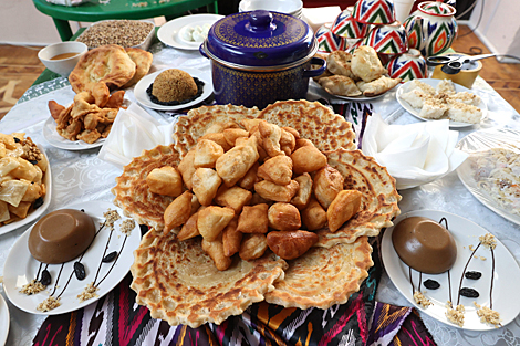 Participants of the Grace International beauty contest demonstrate cooking skills 