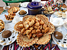 Participants of the Grace International beauty contest demonstrate cooking skills 