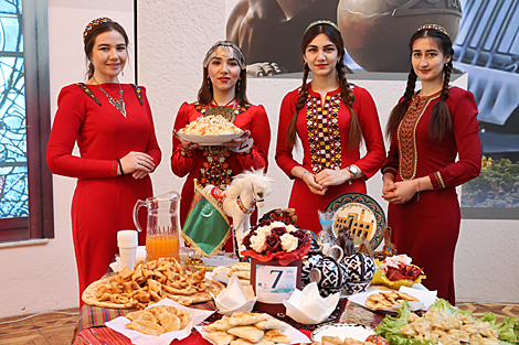 Participants of the Grace International beauty contest demonstrate cooking skills 