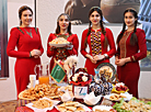 Participants of the Grace International beauty contest demonstrate cooking skills 