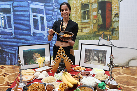 Participants of the Grace International beauty contest demonstrate cooking skills 