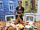 Participants of the Grace International beauty contest demonstrate cooking skills 