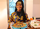 Participants of the Grace International beauty contest demonstrate cooking skills 