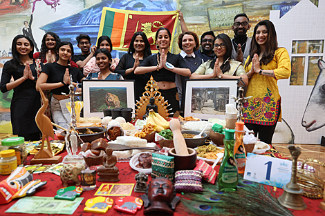 Participants of the Grace International beauty contest demonstrate cooking skills 