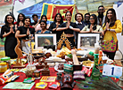 Participants of the Grace International beauty contest demonstrate cooking skills 