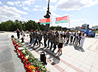 Laying flowers at the Minsk-Hero City Stele