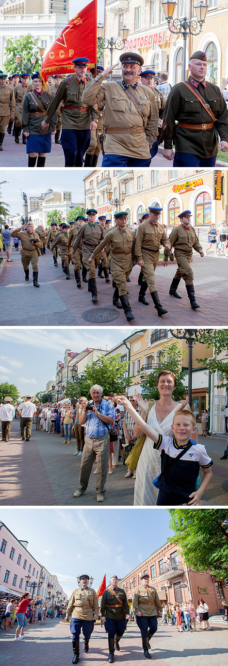 Parade of military reenactment units in the streets of Brest