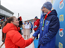 Darya Domracheva awards winners of the Snow Sniper sprint races